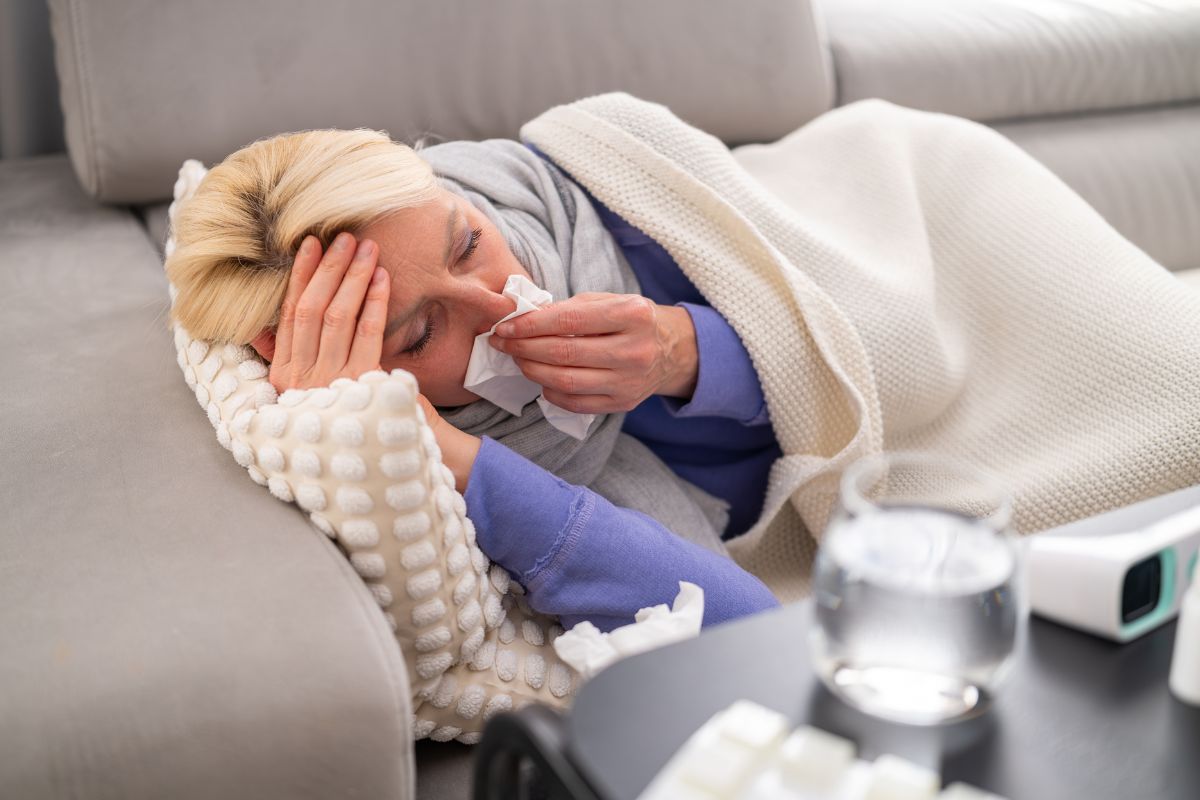 a sick woman lying down